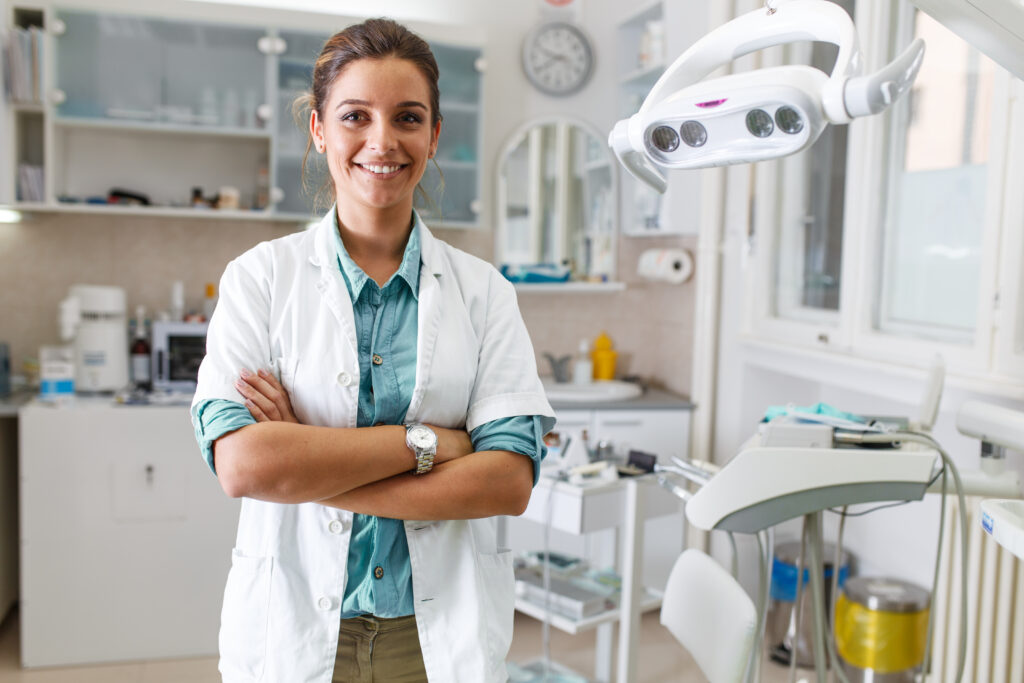 Portrait of Female Dentist Standing in Office